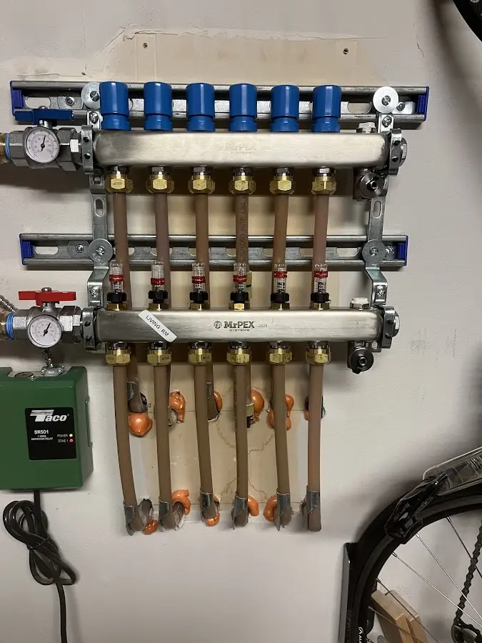 Plumber performing Water Heater Repair at a residential property in Holdrege